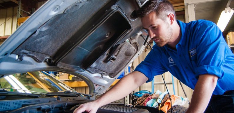 The Job Of A Car Mechanic In A Car Repairing Center